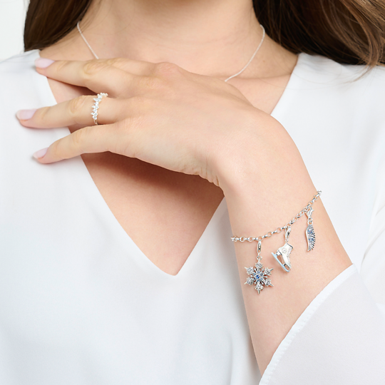 Thomas Sabo Charm Silber "Schneeflocke mit blauen Steinen" 1902-945-7